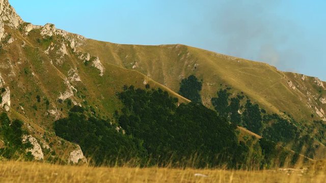 Wind in mountain landscape - (4K)