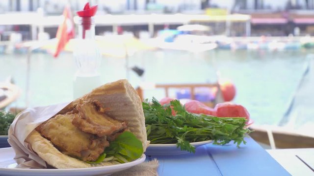 Fast food, grilled fish burger sandwich. Izmir Foca Turkey.