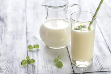 Foto op Plexiglas Milkshake Glass of banana milk shake