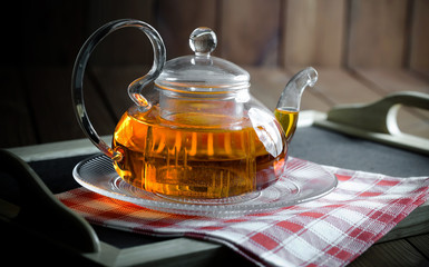 Tea in a cup on an old background