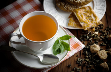 Tea in a cup on an old background