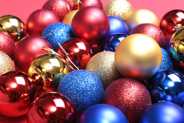 Fototapeta na wymiar Christmas decorations with coloured balls on wooden background