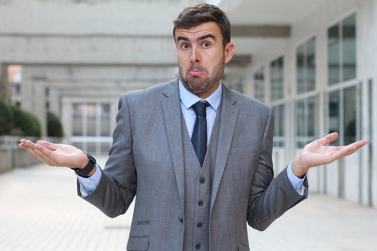 Businessman with "I have no idea" expression