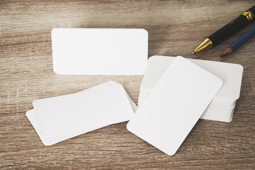 Blank corporate identity business card package on worker table