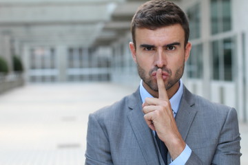 Businessman telling you to shut up