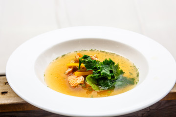 Fish soup with salmon and clear broth.