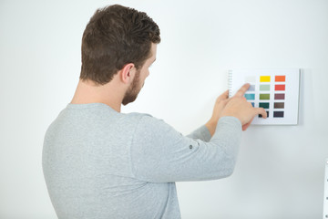 man going to change the wall color
