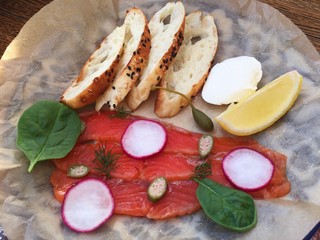 Fresh salmon with croutons cheese and spinach 