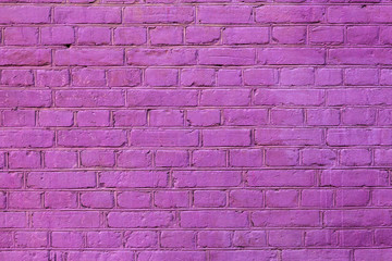 A close-up shot of a pink painted brick wall for creativity, textures and backgrounds.