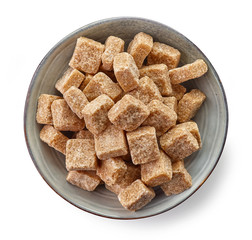 Bowl of brown sugar cubes