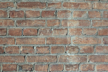 A close-up shot of  the old masonry of red brick for creativity, textures and backgrounds.