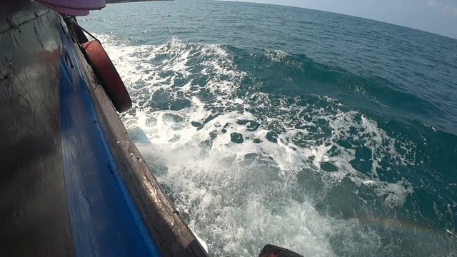 Slow motion : Boat side view of Thailand ocean transportation travel
