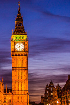 Big Ben Clock Tower at night - London travel. Parliament house at city of Westminster, London, England, Great Britain, UK. Europe travel destination.