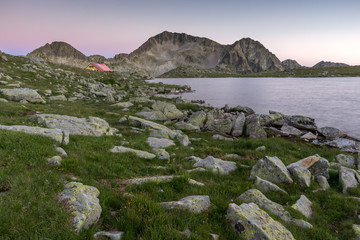 Sunset landscape with Kamenitsa peak and Tevno lake, Pirin Mountain, Bulgaria