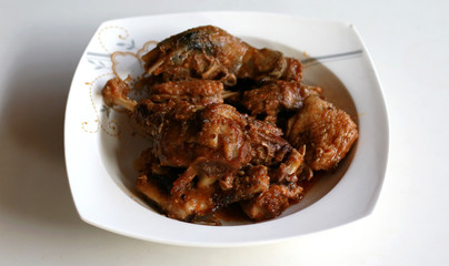 Duck Rica Rica. Hot and spicy cuisine from Manado, North Sulawesi, Indonesia. Uses a lot of chopped or ground red and green chili peppers, bird's eye chili, shallots, garlic, and ginger.