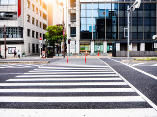 Crosswalk on a road in city, cross road, downtown, morning.