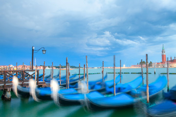 gondolas on the berth in Venice
