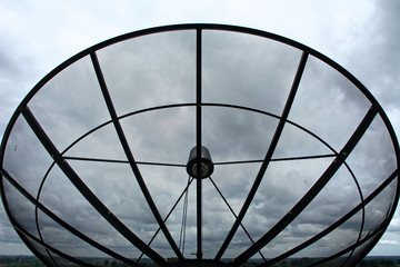 Satellite dish in cloudy day