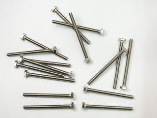 screw and nuts on white background