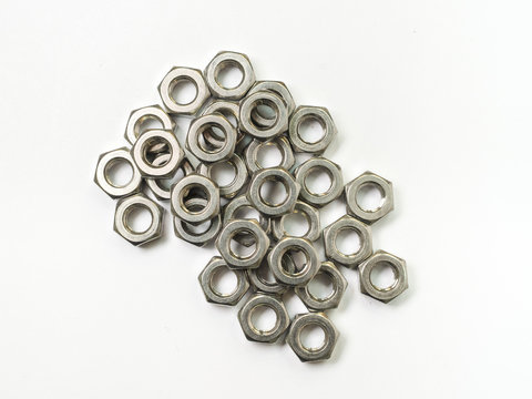 screw and nuts on white background