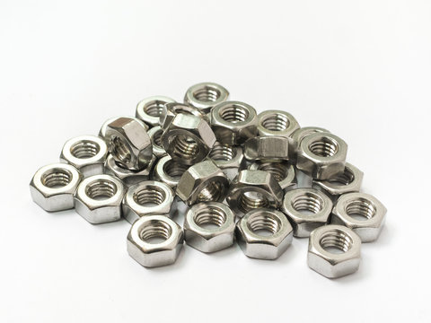 screw and nuts on white background