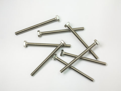 screw and nuts on white background