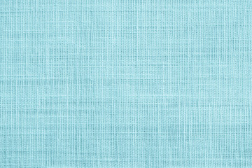 Jute hessian sackcloth canvas sack cloth woven texture pattern background in teal cyan blue color