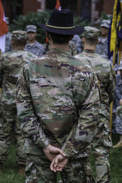 Commander standing from of soldiers