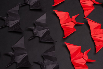 Halloween Background. Black background. Red and black bats