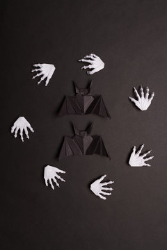 Black Halloween Background with White Skeleton Hands