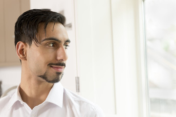 Dark-Haired Bearded Young Man in Collared White Shirt Copy Space