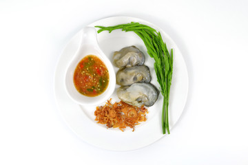 Oyster on white dish.