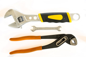 Obraz premium Adjustable pliers and Wrench on white background