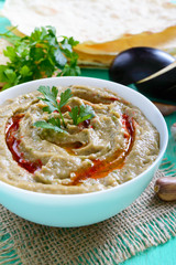 Baba ganush - hummus from eggplant with seasoning, parsley. Eastern cuisine.
