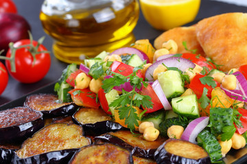 chickpea Salad with eggplants, vegetables and pita