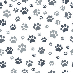 Fototapeta na wymiar Paw print seamless. Traces of Cat Textile Pattern. Cat footprint seamless pattern. Vector seamless