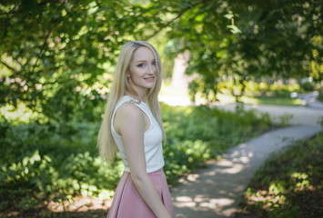 Outdoors portrait of beautiful young woman. Selective focus.