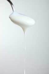 Spoon with yogurt
