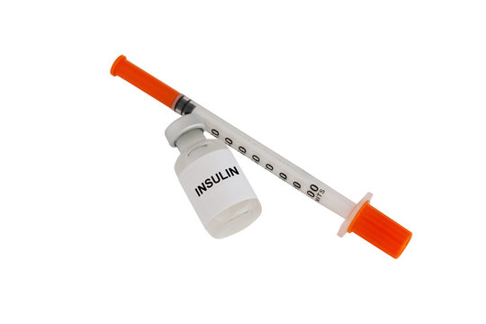 Diabetes concept. Insulin bottle and Syringe isolated on a white background. World Diabetes Day. 14 November.