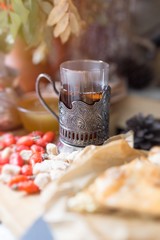 Naklejka na ściany i meble autumn tea party, retro mugs in rustic style, with honey and cakes.