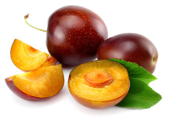 fresh plum fruit with cut plum slices isolated on white background