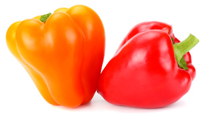 two red and yellow sweet bell peppers isolated on white background