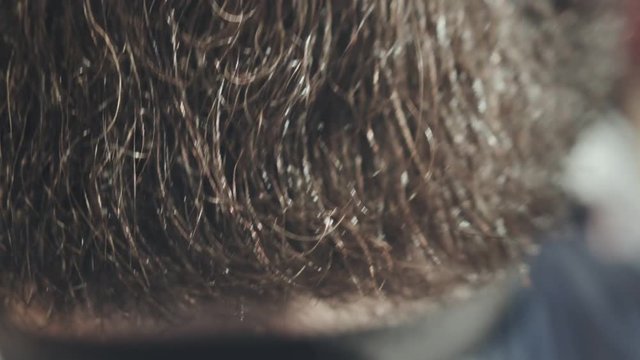 Hipster man beard care. Man beard style. Close up of combing hair beard on face hipster. Bearded hipster face. Hipster moustache lips. Moustache man face. Moustache close up. Barber comb