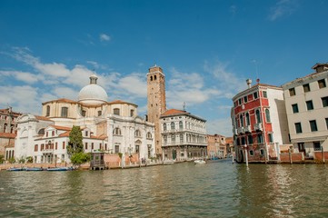 Fototapeta na wymiar venice August2017: sailing through the canals in venice admiring the ancient buildings
