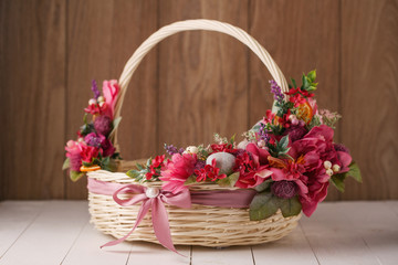 Fototapeta na wymiar Easter basket with decorated eggs