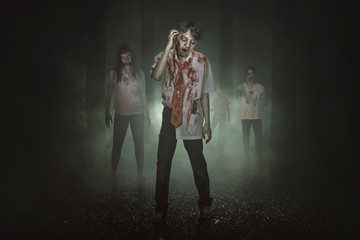Some spooky asian zombies with blood walking around