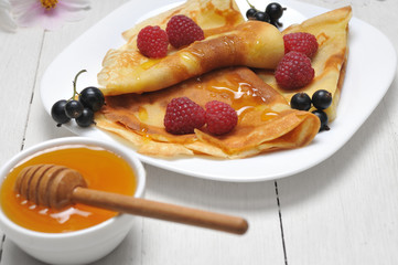 Pancake - Crepes with berries and honey