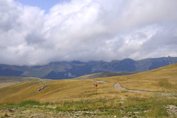 Fototapeta premium Ski track in summer mountains