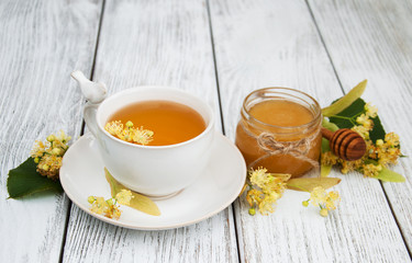 cup of herbal tea with linden flowers
