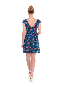 Details of women's clothing. Detail dress on a model on a white background